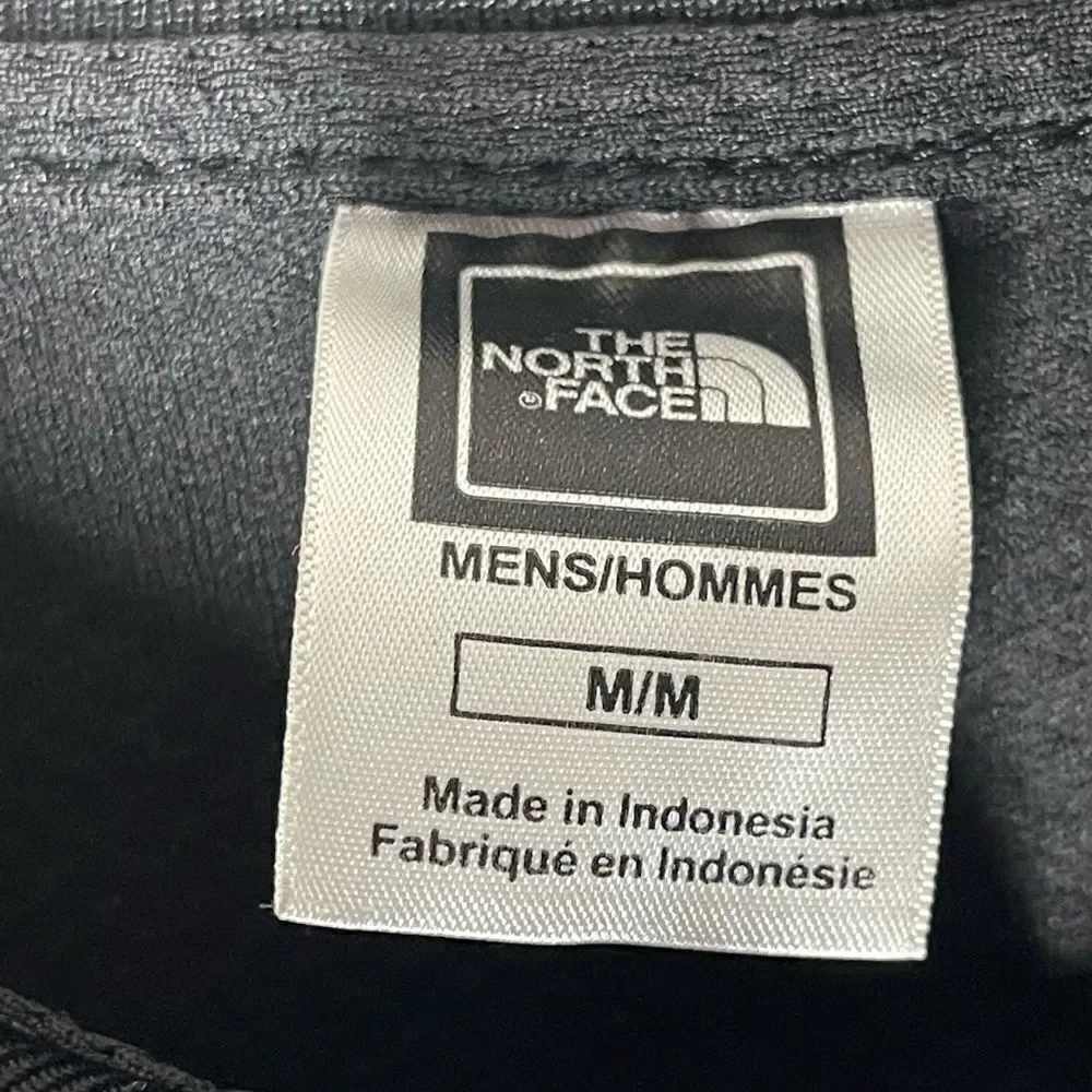 The North Face black‎ polo style with zipper shirt, size medium’s